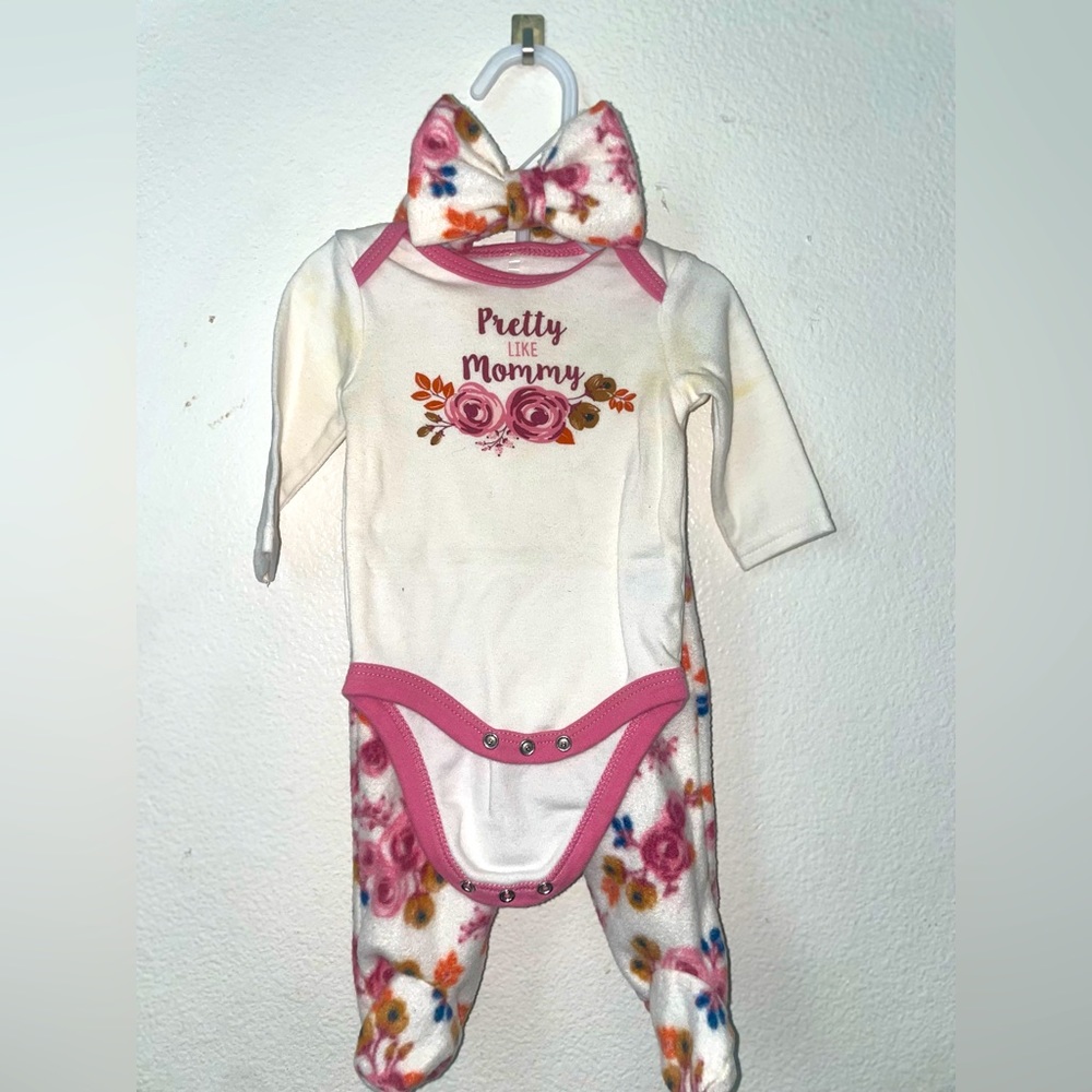 0-3 month onesie set with matching head bow and pants.